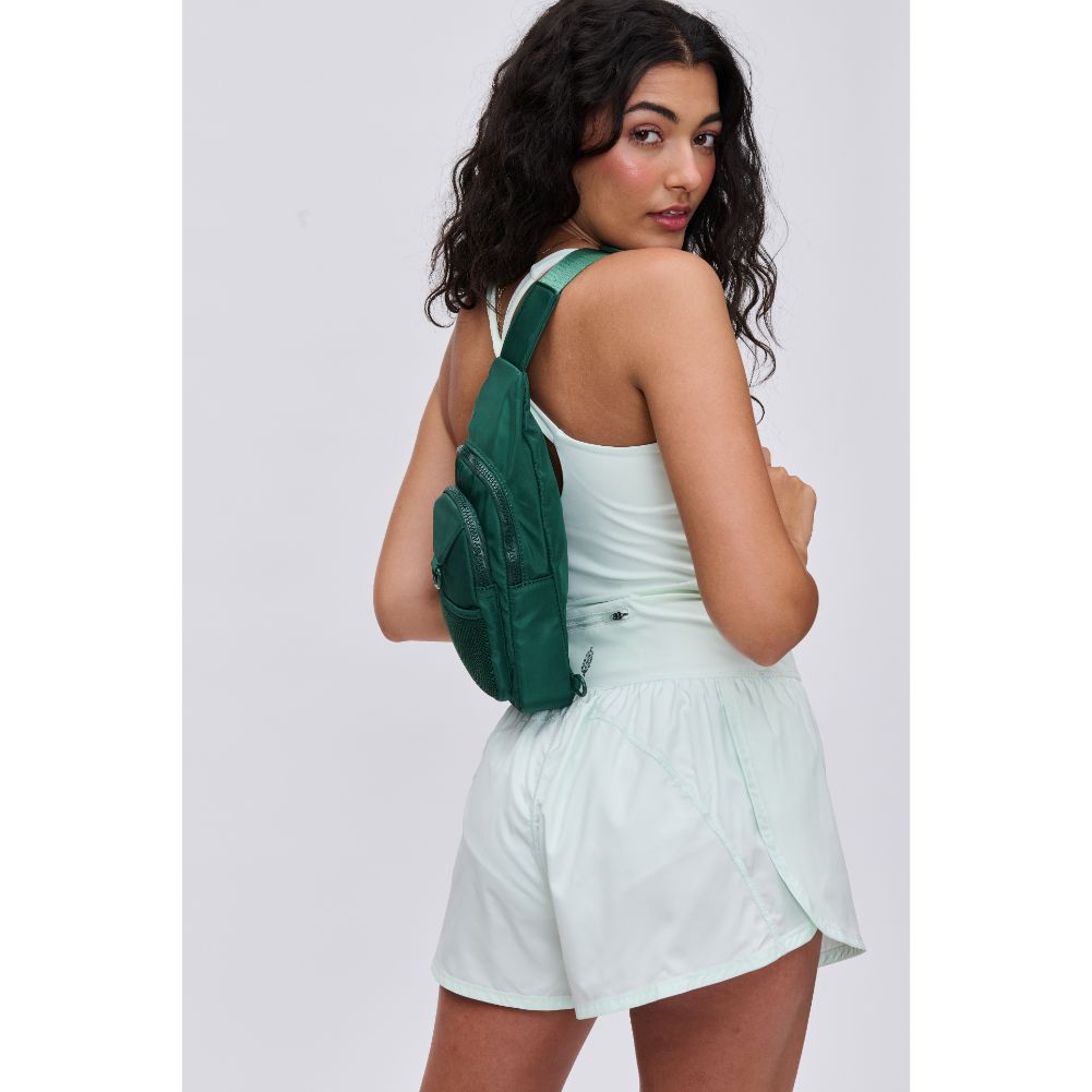 Woman wearing Forest Urban Expressions Walker - Nylon Sling Backpack 840611114372 View 3 | Forest