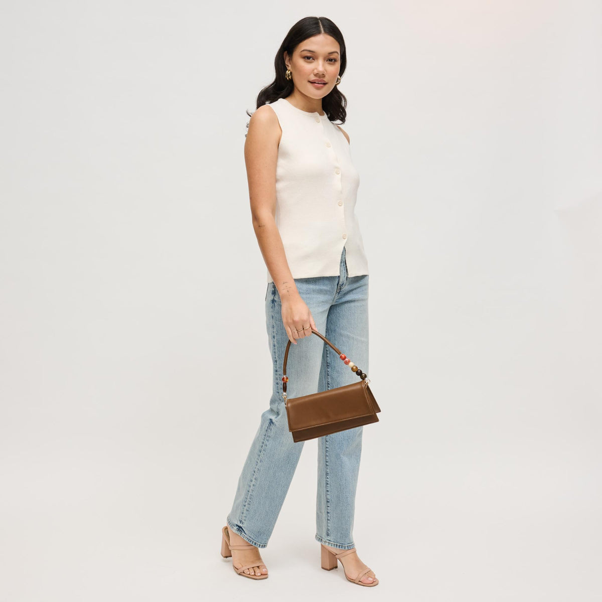 Woman wearing Chocolate Urban Expressions Brooks Crossbody 840504206665 View 2 | Chocolate