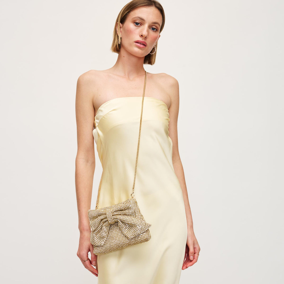Woman wearing Gold Urban Expressions Gretchen Evening Bag 840611156372 View 1 | Gold