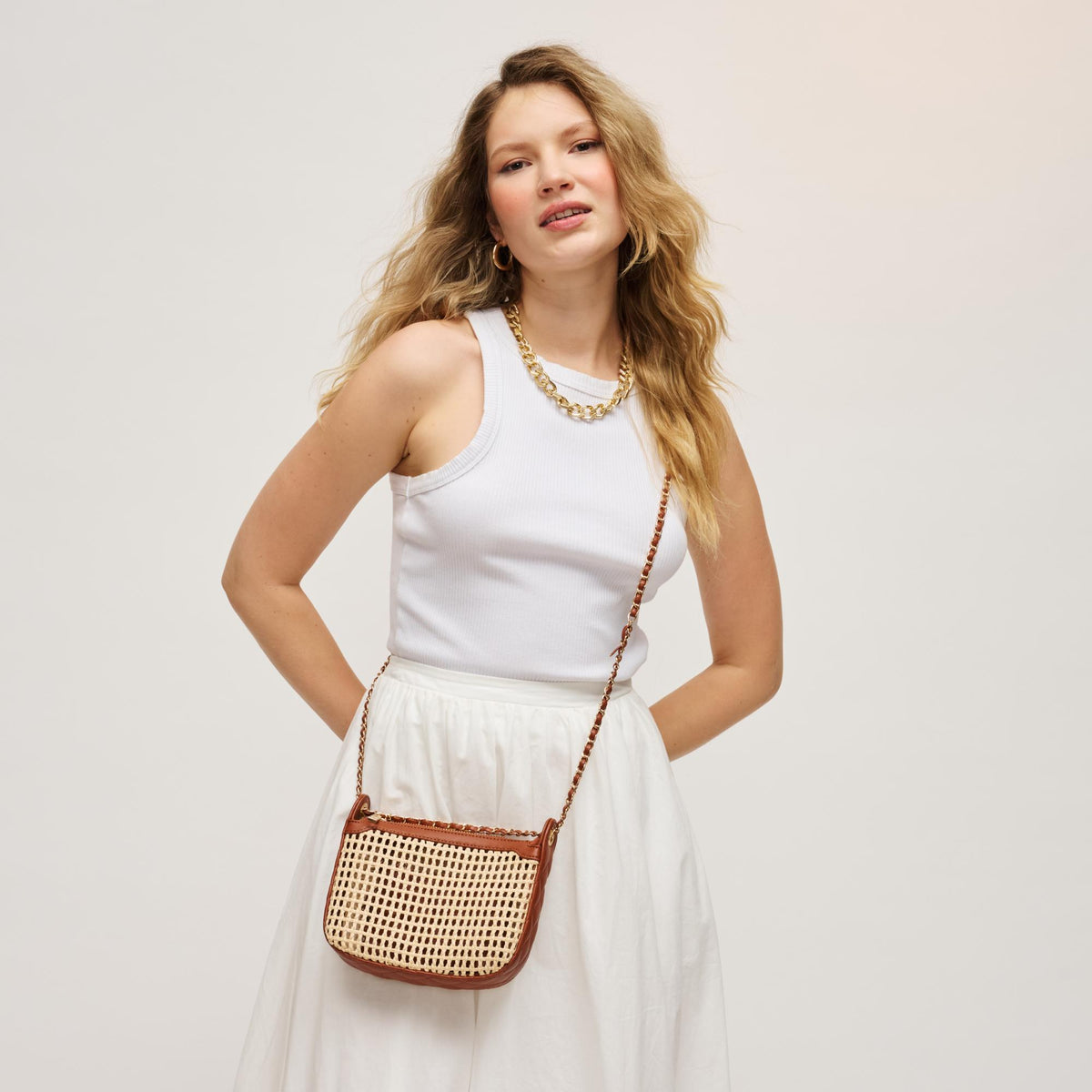 Woman wearing Natural Tan Urban Expressions Skyler Crossbody 840504204166 View 1 | Natural Tan