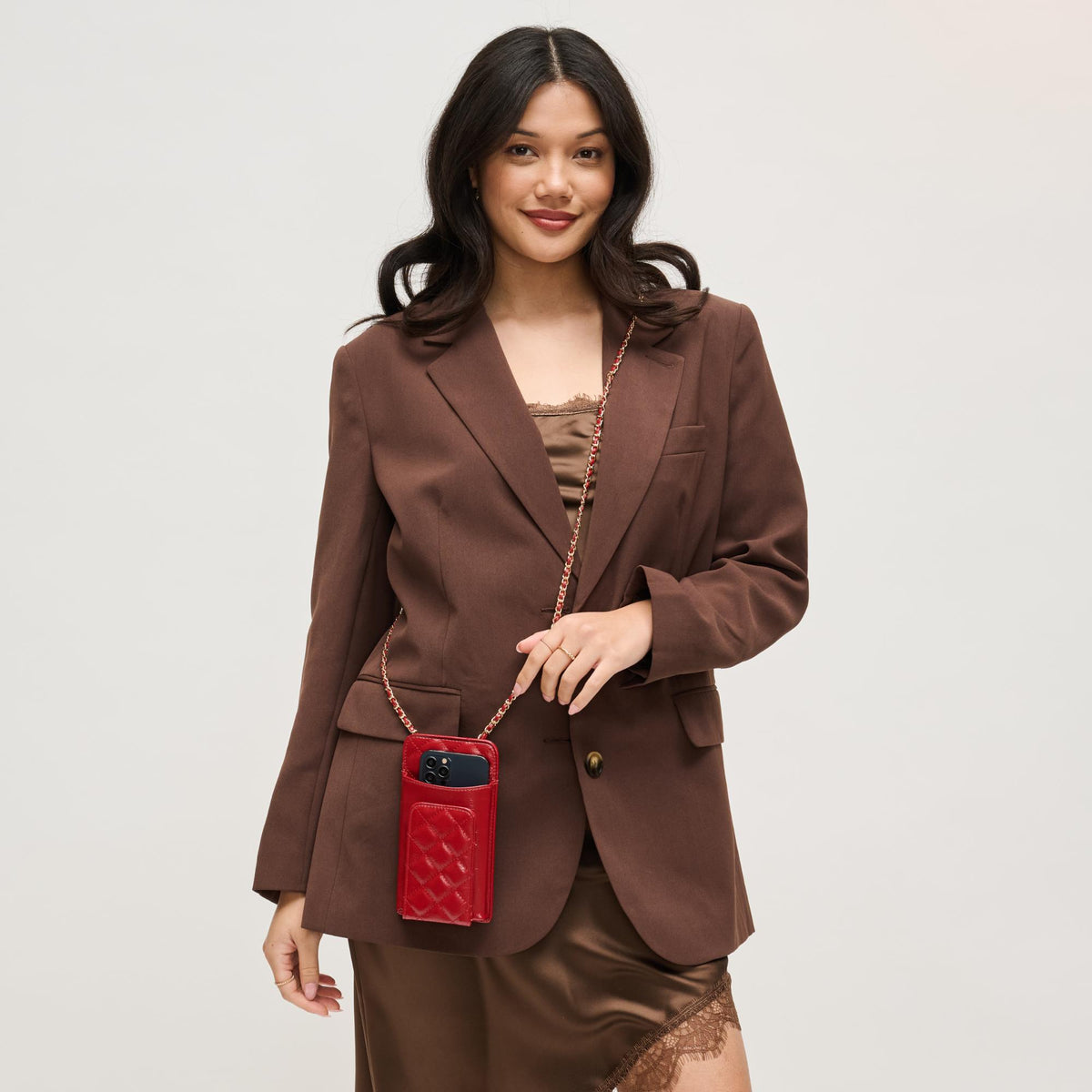 Woman wearing Red Urban Expressions Brianna 2.0 Cell Phone Crossbody 840504203749 View 2 | Red