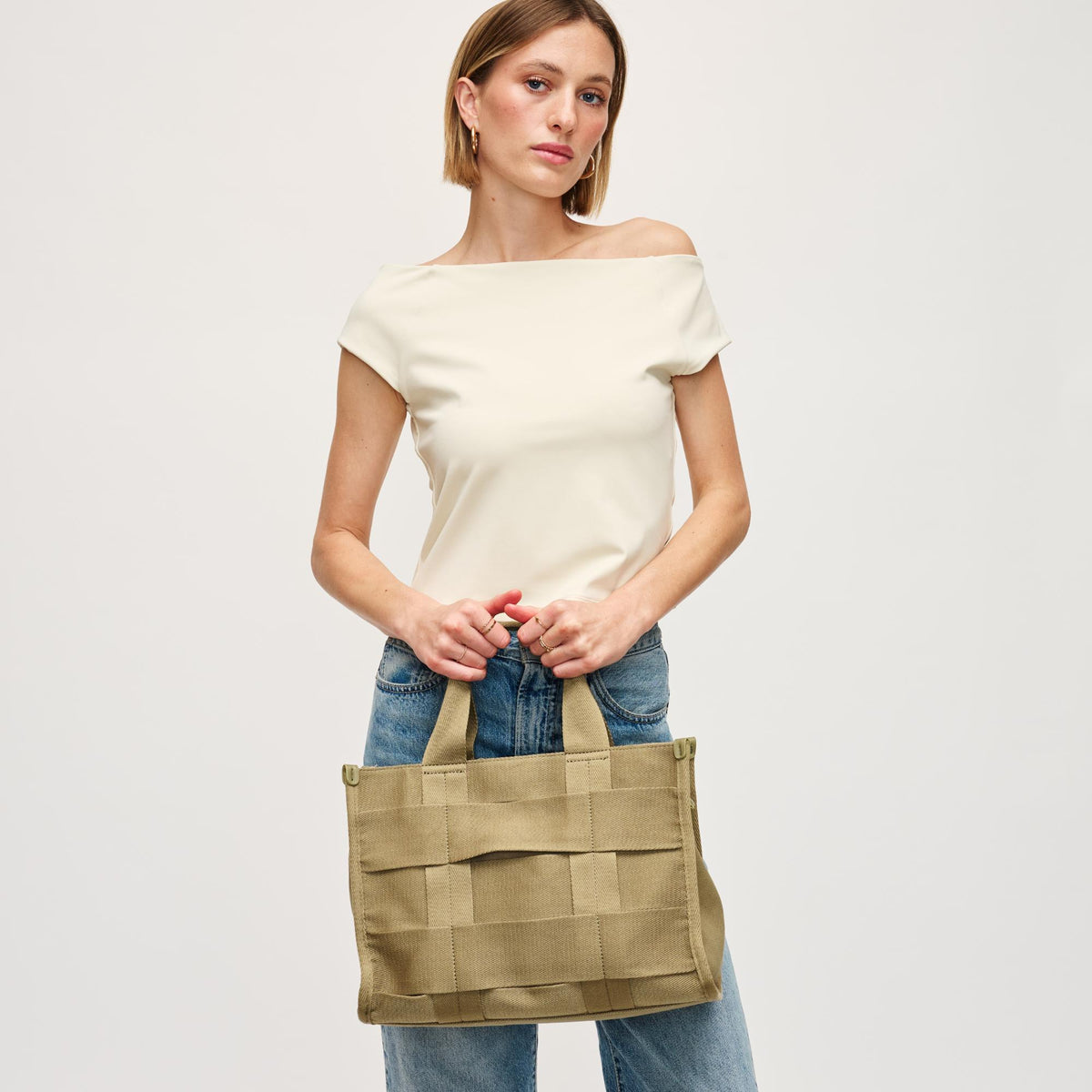 Woman wearing Sage Urban Expressions Cherie Satchel 840611157003 View 3 | Sage