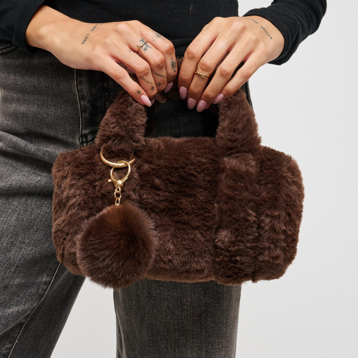 Woman wearing Chocolate Urban Expressions Lexi Crossbody 840611199843 View 1 | Chocolate
