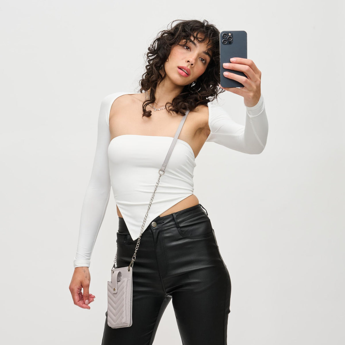 Woman wearing Dove Grey Urban Expressions Claire - Chevron Stitch Cell Phone Crossbody 840611190642 View 3 | Dove Grey