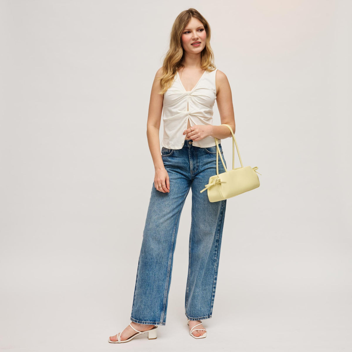 Woman wearing Butter Urban Expressions Halo Shoulder Bag 840504207839 View 4 | Butter