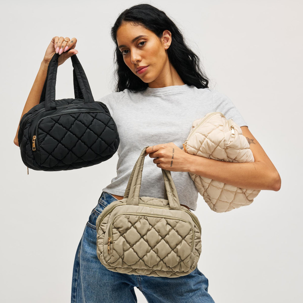 Woman wearing Black Urban Essentials Zip Me Pretty - Quilted Puffer Travel Organizer 840504201172 View 3 | Black
