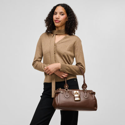 Woman wearing Brown Urban Expressions Moda Satchel 840504211690 View 1 | Brown