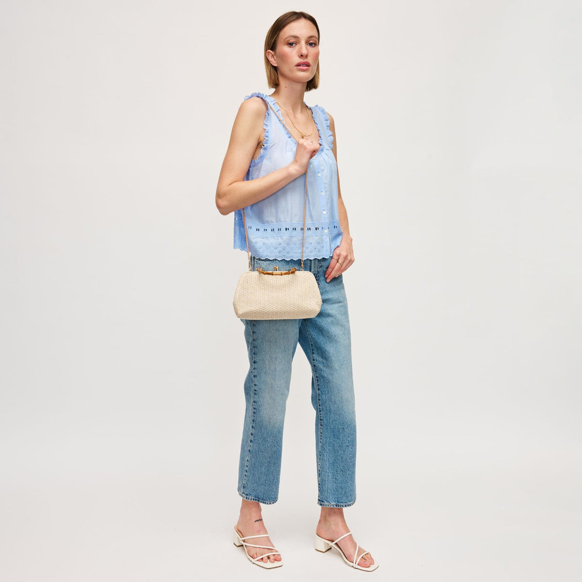 Woman wearing Ivory Urban Expressions Lucy - Straw Crossbody 840611154385 View 4 | Ivory
