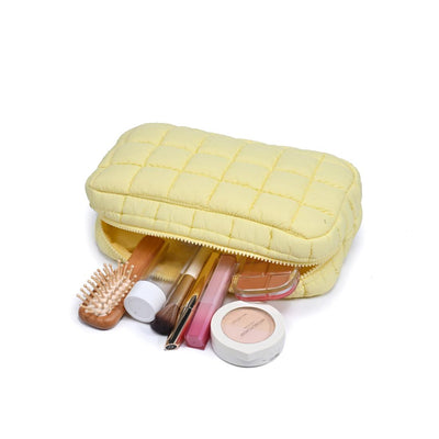 Woman wearing Butter Urban Essentials Cloud Nine - Puffer Cosmetic & Travel Organizer Pouch 840611143792 View 1 | Butter