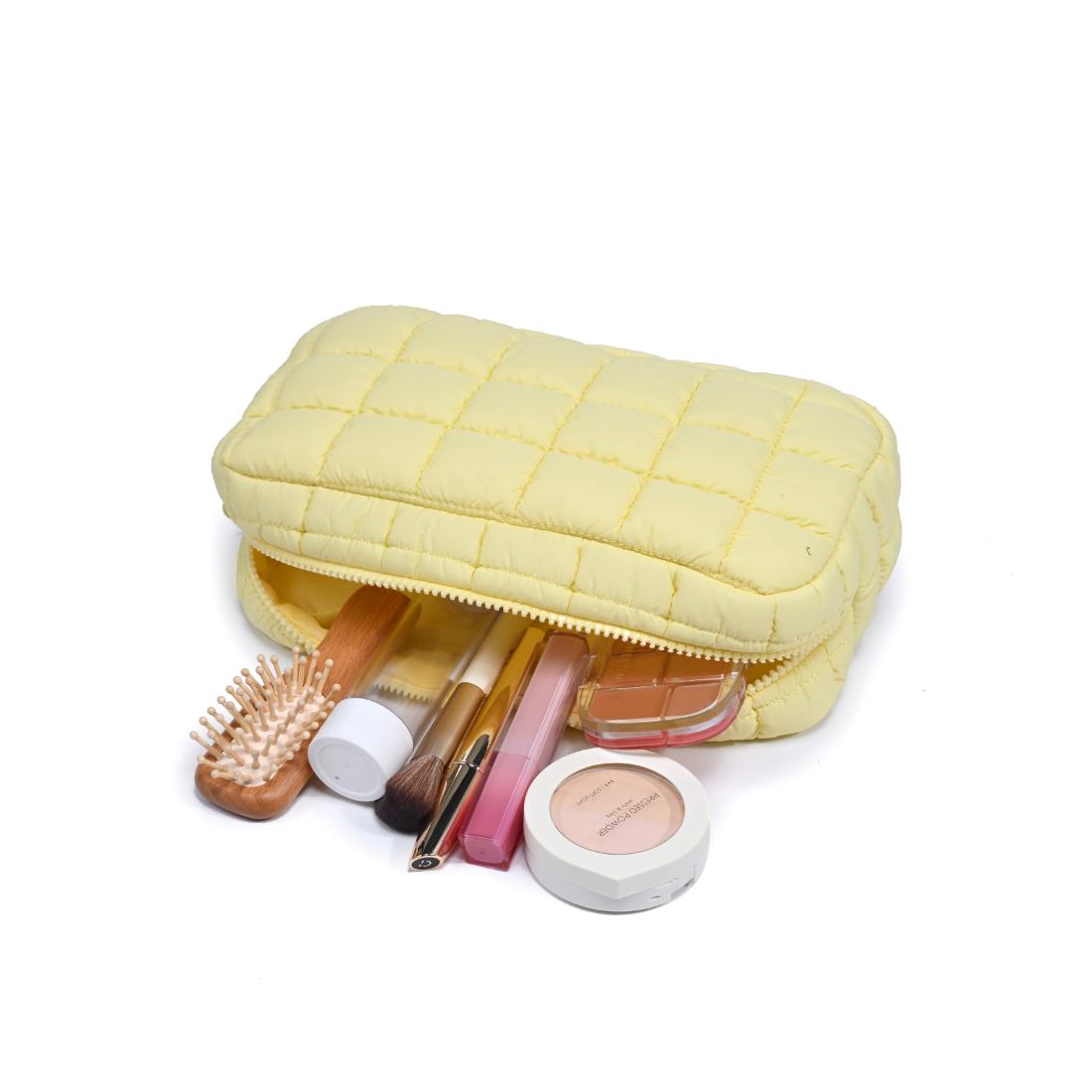 Woman wearing Butter Urban Essentials Cloud Nine - Puffer Cosmetic & Travel Organizer Pouch 840611143792 View 1 | Butter