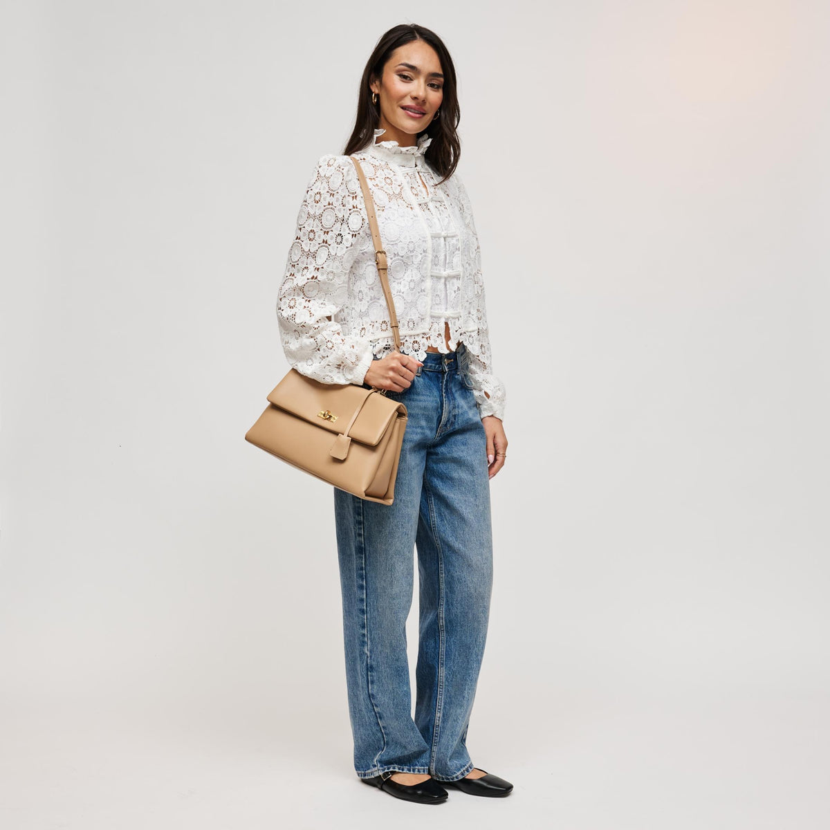 Woman wearing Natural Urban Expressions Arrow Satchel 840504212949 View 4 | Natural