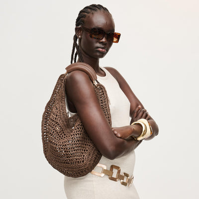 Woman wearing Chocolate Urban Expressions Camden Hobo 840504202995 View 1 | Chocolate