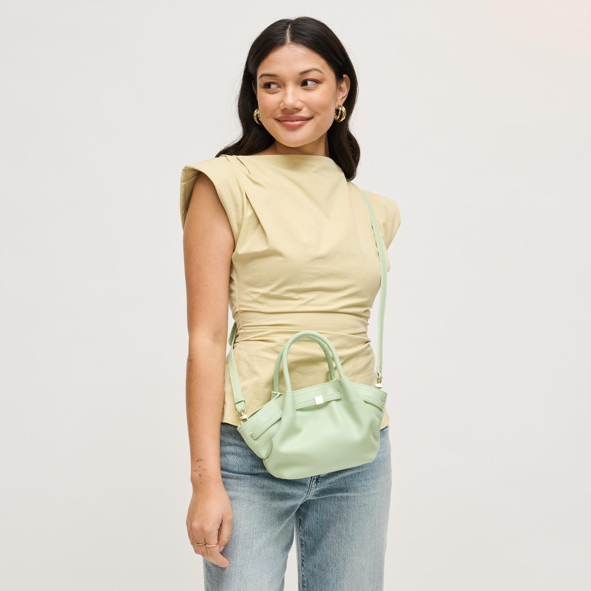 Woman wearing Green Urban Expressions Selena - Color Pop Crossbody 840504204944 View 1 | Green