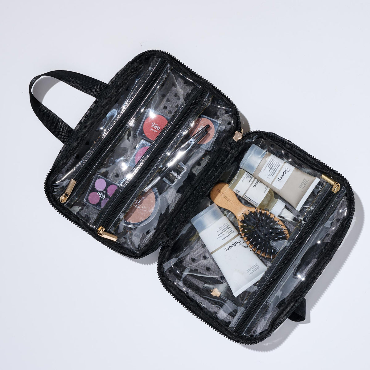 Woman wearing Black Urban Essentials Kiss & Carry Travel Organizer 840611197887 View 2 | Black