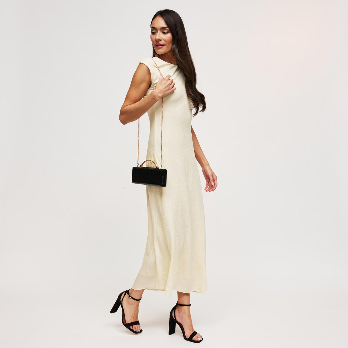 Woman wearing Black Urban Expressions Banks Clutch 840504212048 View 3 | Black