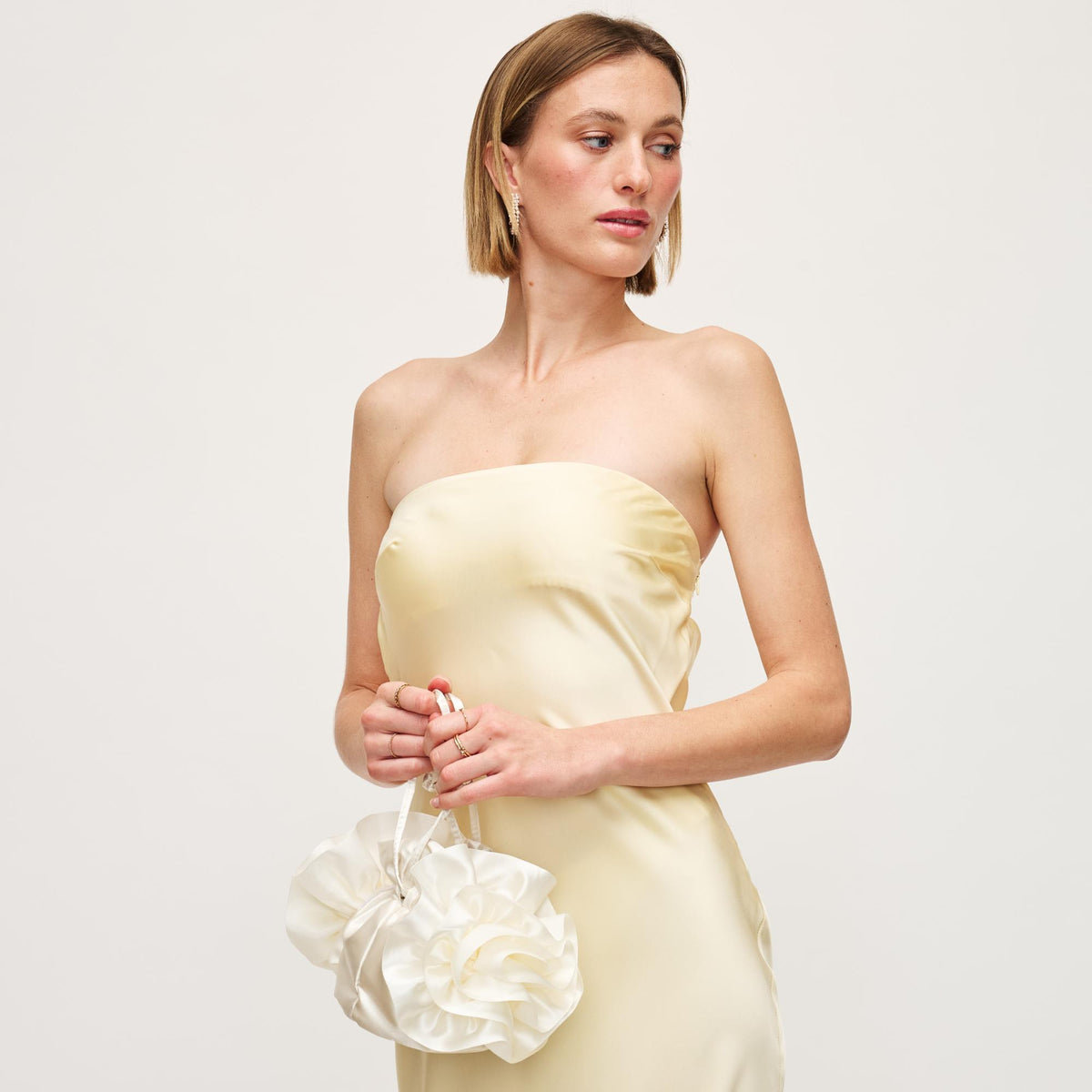 Woman wearing Ivory Urban Expressions Fleur Luxe Evening Bag 840611149800 View 2 | Ivory