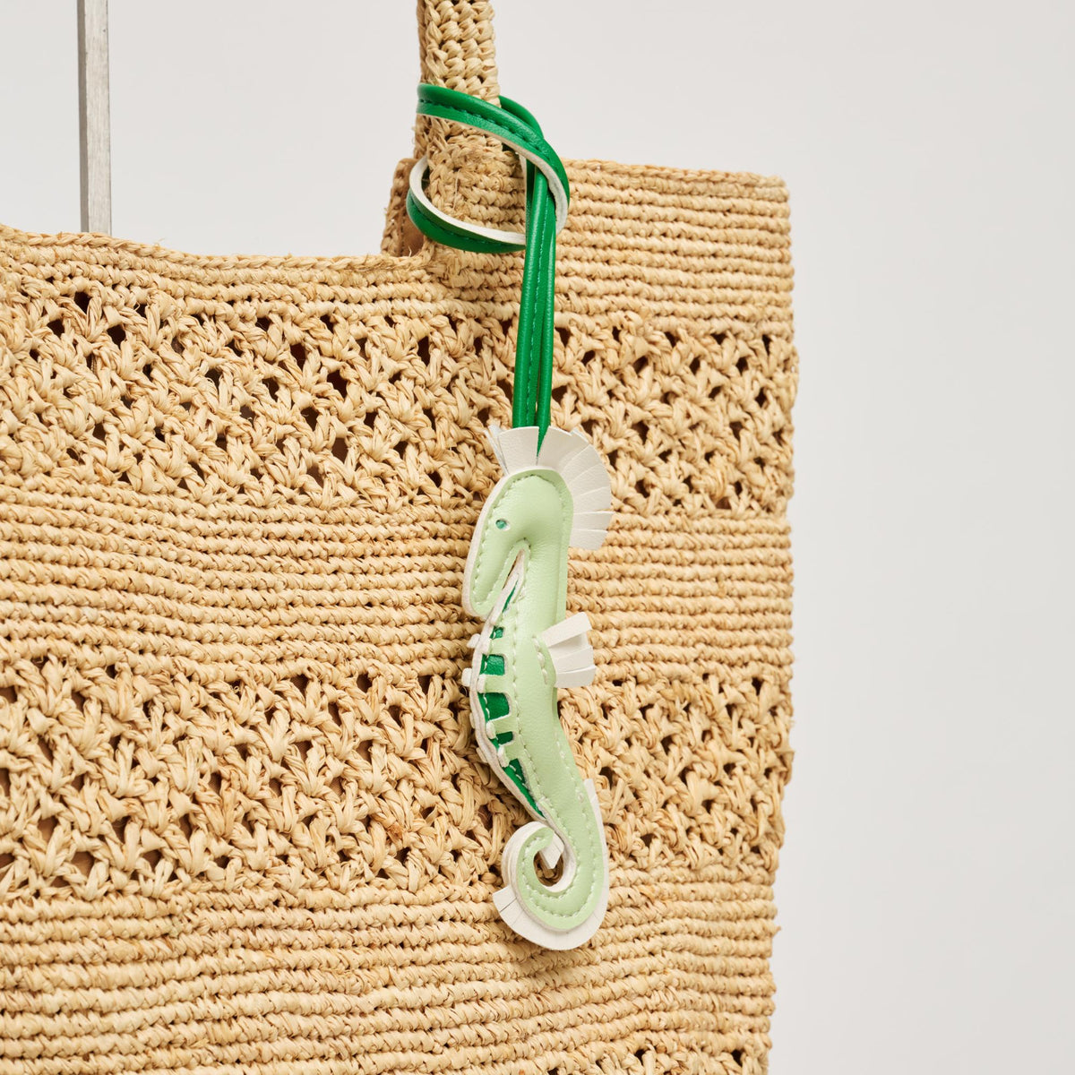 Woman wearing Green Urban Expressions Seahorse Hanging Charm 840504209116 View 2 | Green