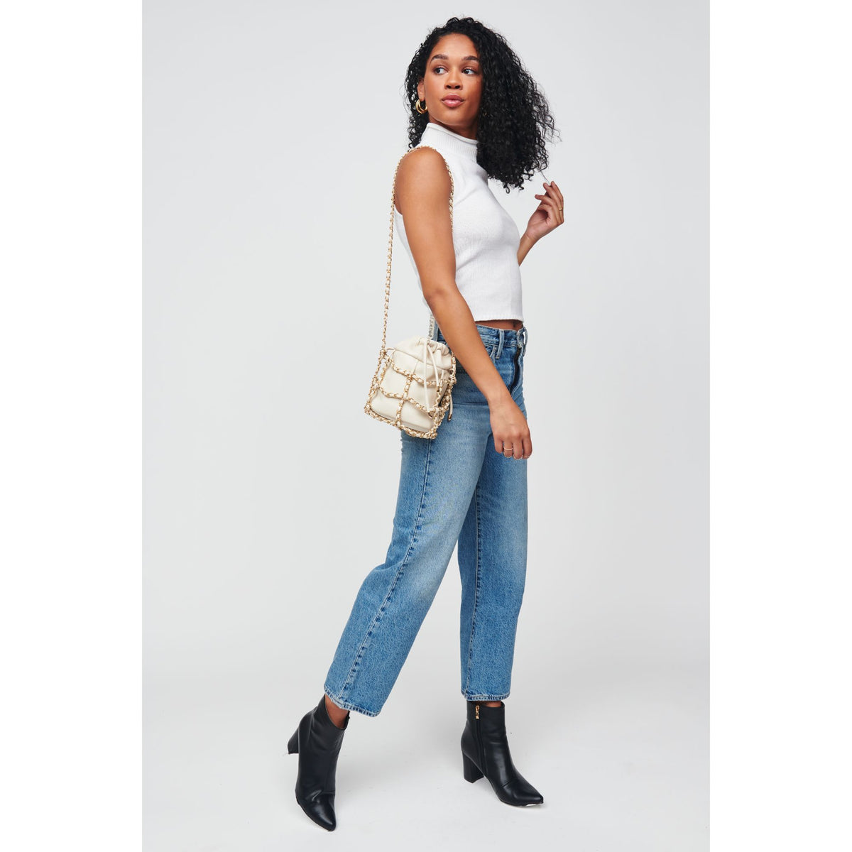 Woman wearing Oatmilk Urban Expressions Moira Crossbody 818209012348 View 3 | Oatmilk