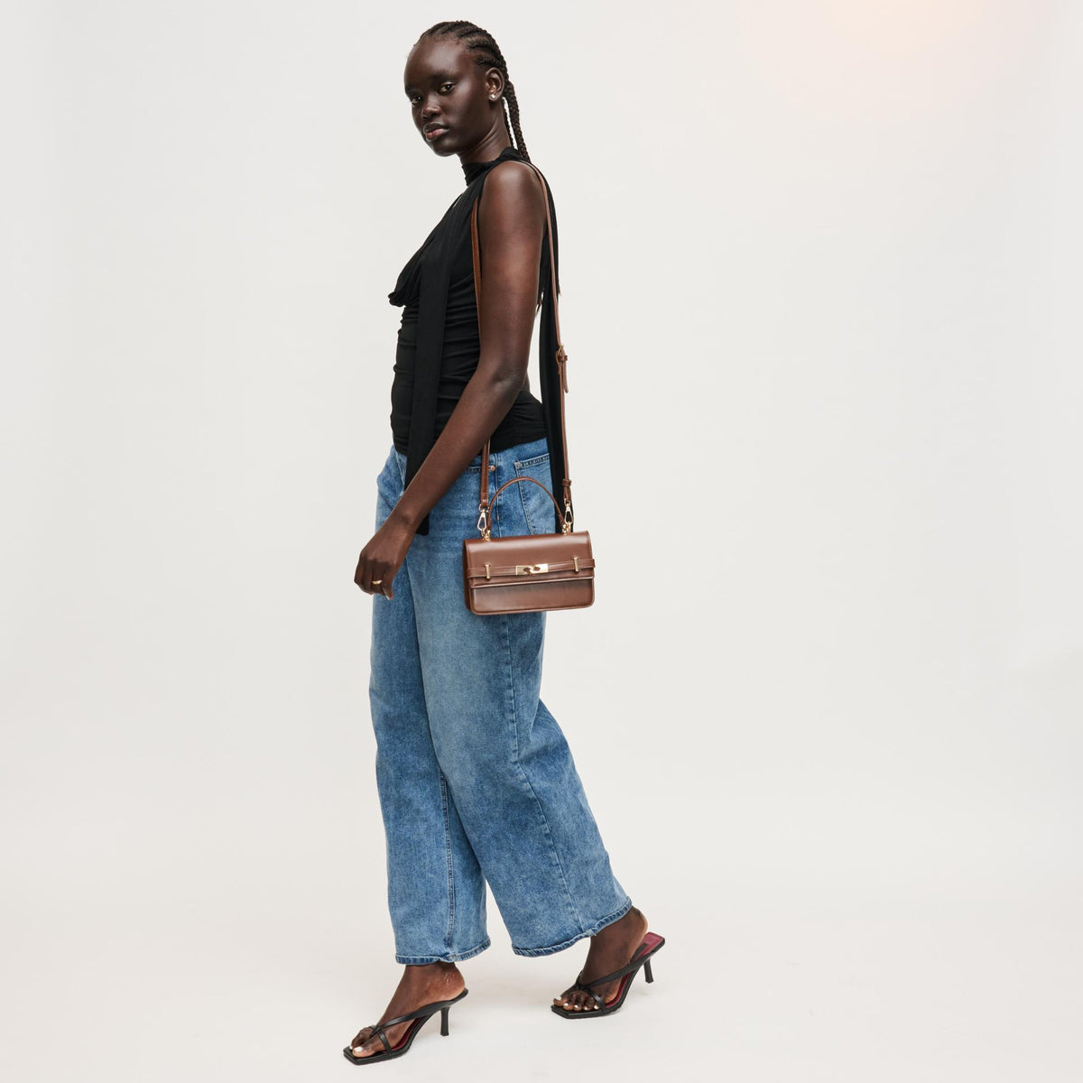 Woman wearing Chocolate Urban Expressions Lily Crossbody 840504205804 View 2 | Chocolate