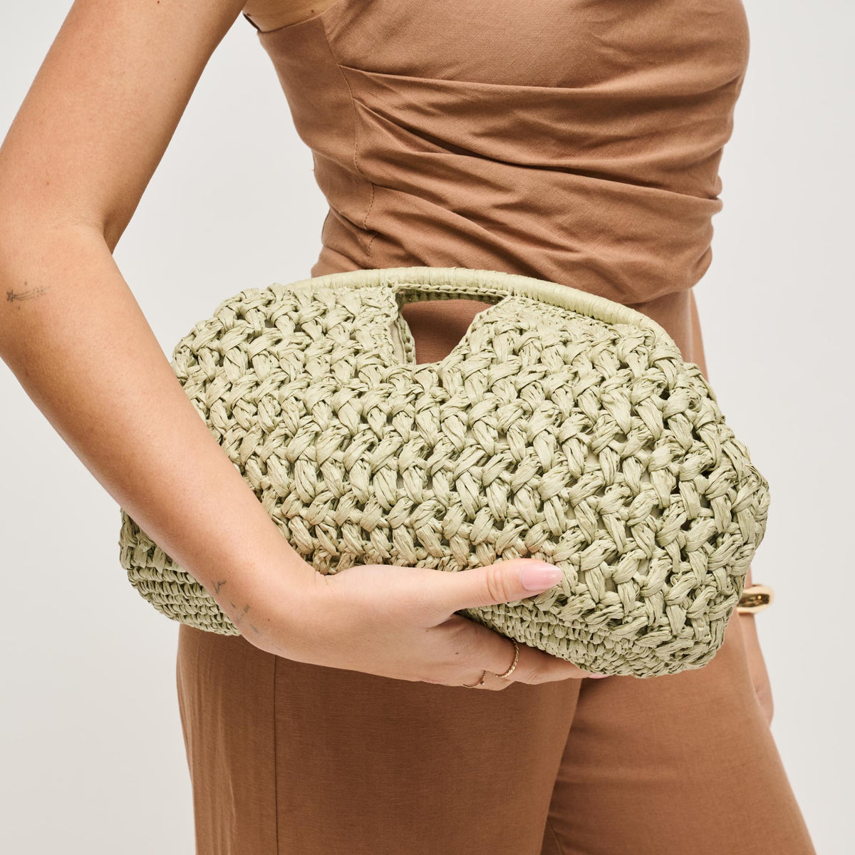 Woman wearing Sage Urban Expressions Abigail Crossbody 840504204135 View 1 | Sage