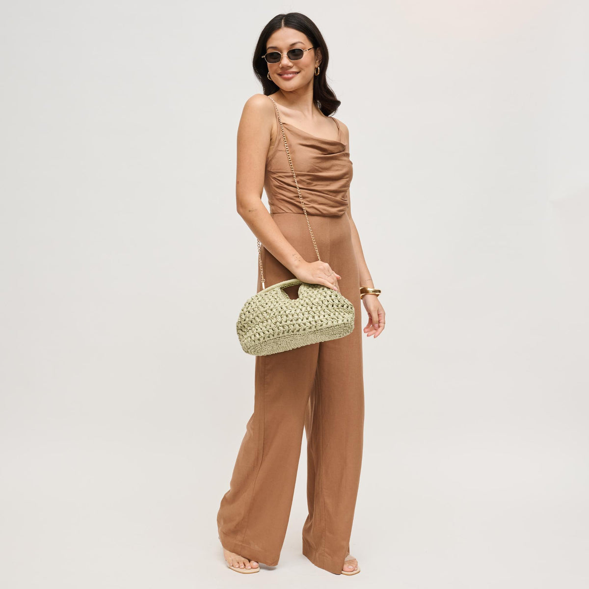 Woman wearing Sage Urban Expressions Abigail Crossbody 840504204135 View 3 | Sage