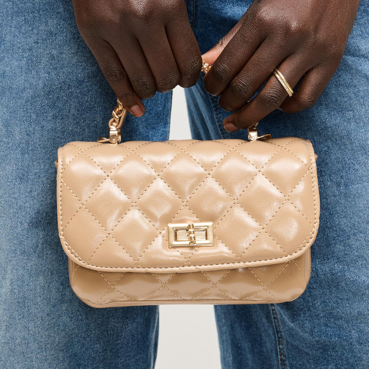 Woman wearing Natural Urban Expressions Leo Crossbody 840504205071 View 1 | Natural