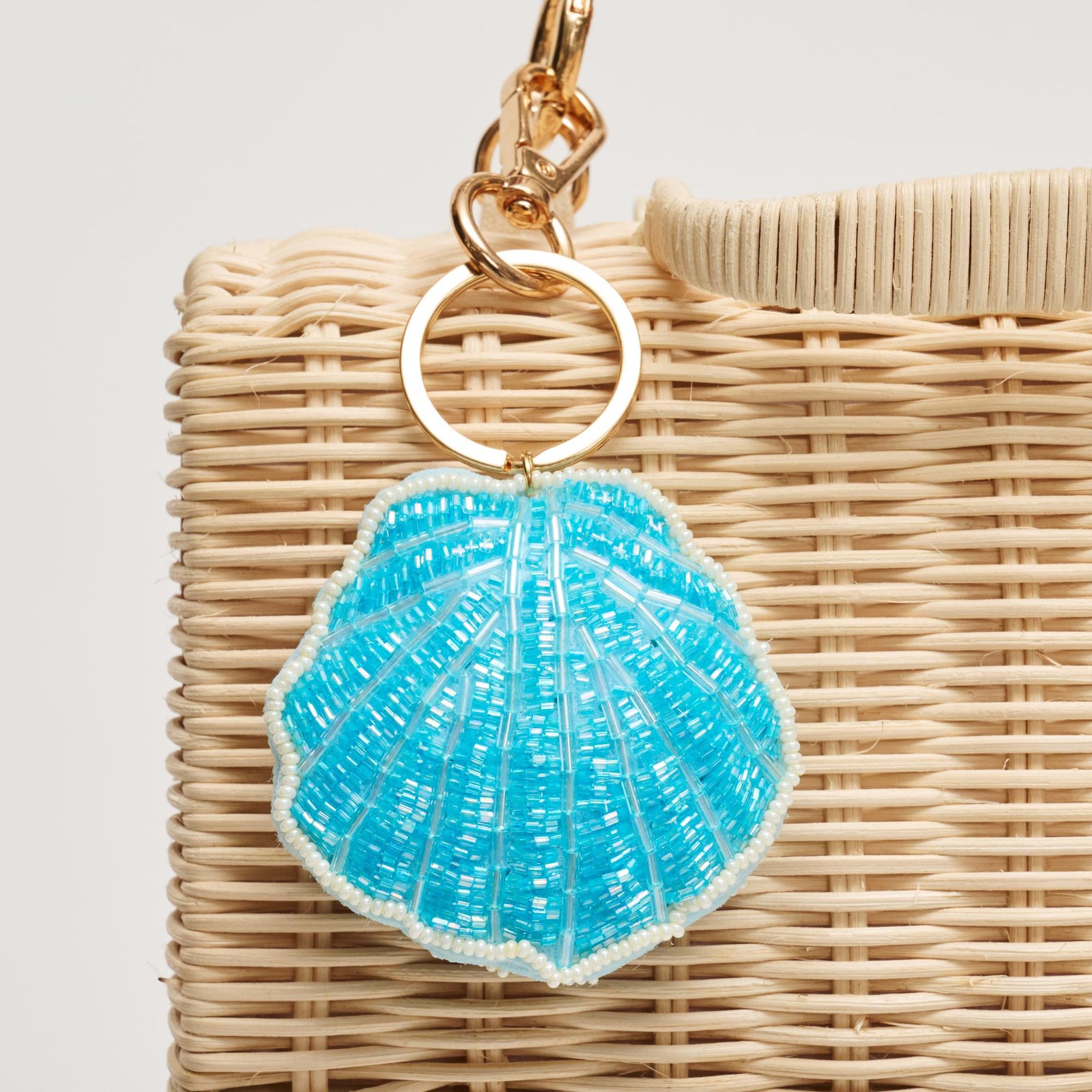 Woman wearing Blue Urban Expressions Shell Keychain Charm 840504209208 View 1 | Blue