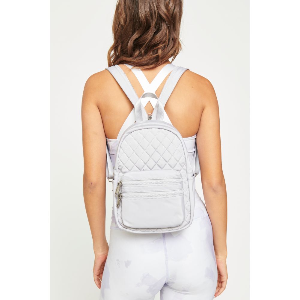Woman wearing Grey Urban Expressions Brynlee Sling Backpack 840611180469 View 1 | Grey
