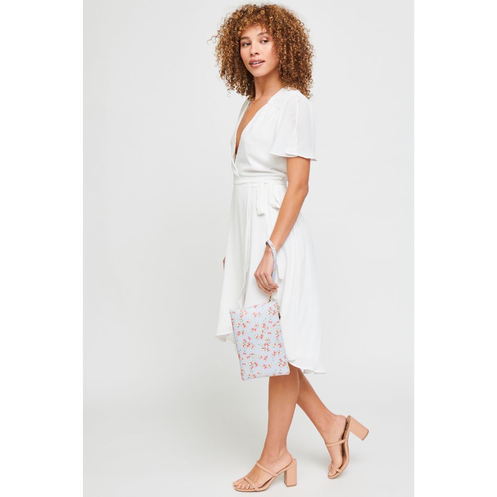 Woman wearing Powder Blue Urban Expressions Joan Floral Wristlet 840611181145 View 2 | Powder Blue