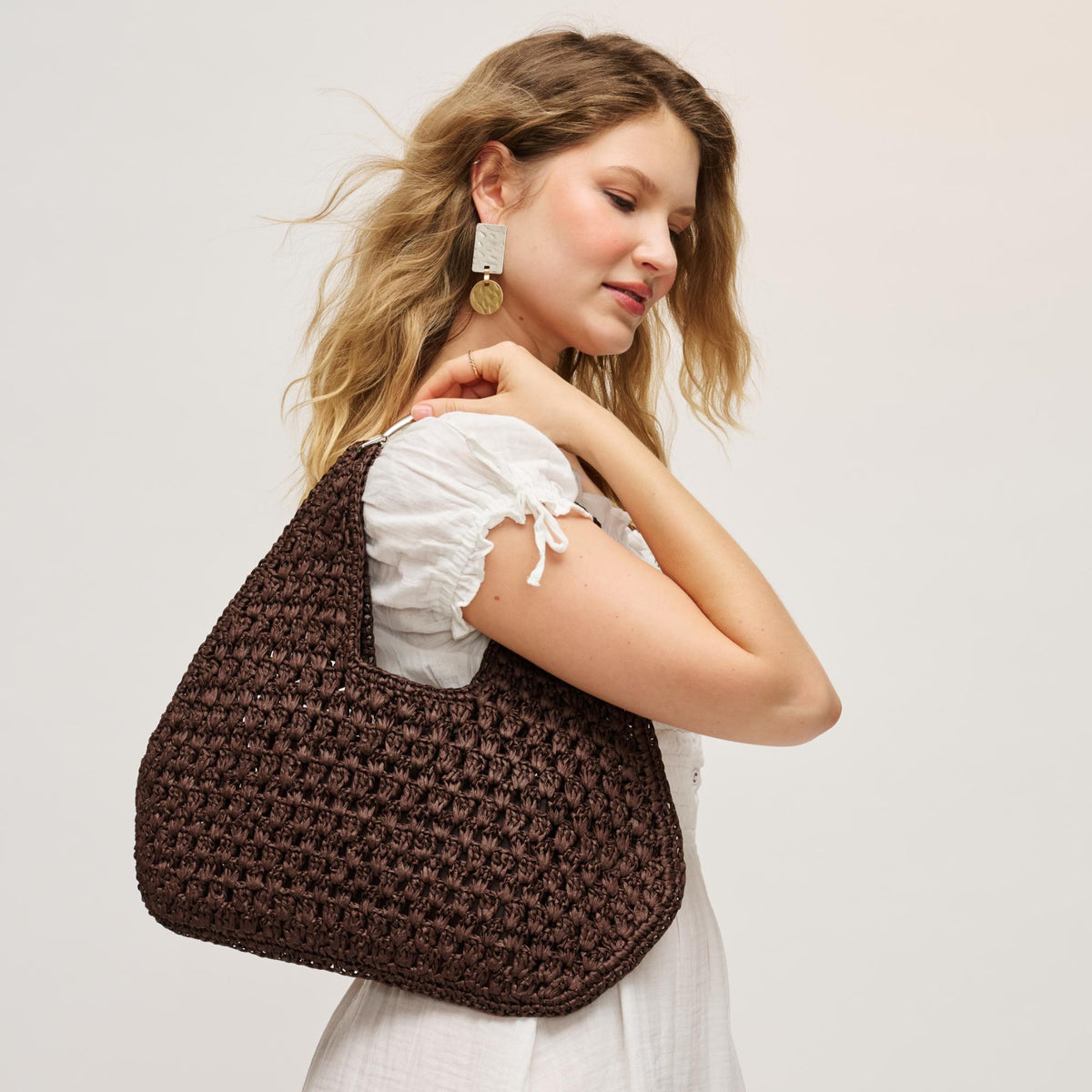 Woman wearing Chocolate Urban Expressions Iris Hobo 840504204838 View 3 | Chocolate