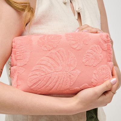 Woman wearing Peach Urban Essentials Palm Breeze Cosmetic & Travel Organizer Pouch 840611195302 View 1 | Peach