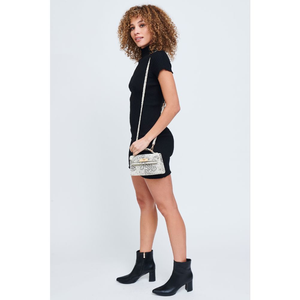 Woman wearing Ivory Black Urban Expressions Georgina Snake Crossbody 840611181282 View 4 | Ivory Black
