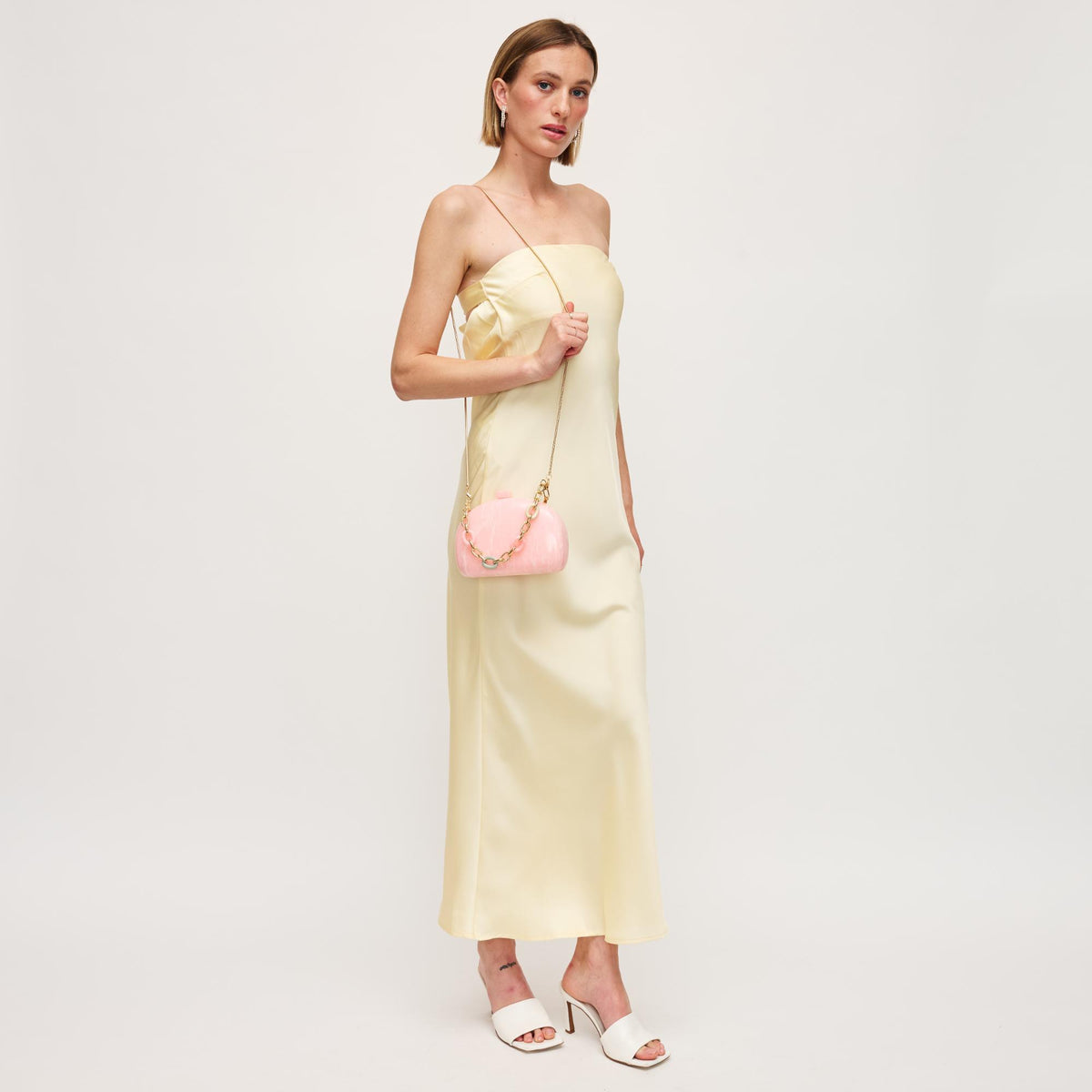 Woman wearing Light Pink Urban Expressions Morgan Evening Bag 840611151513 View 4 | Light Pink