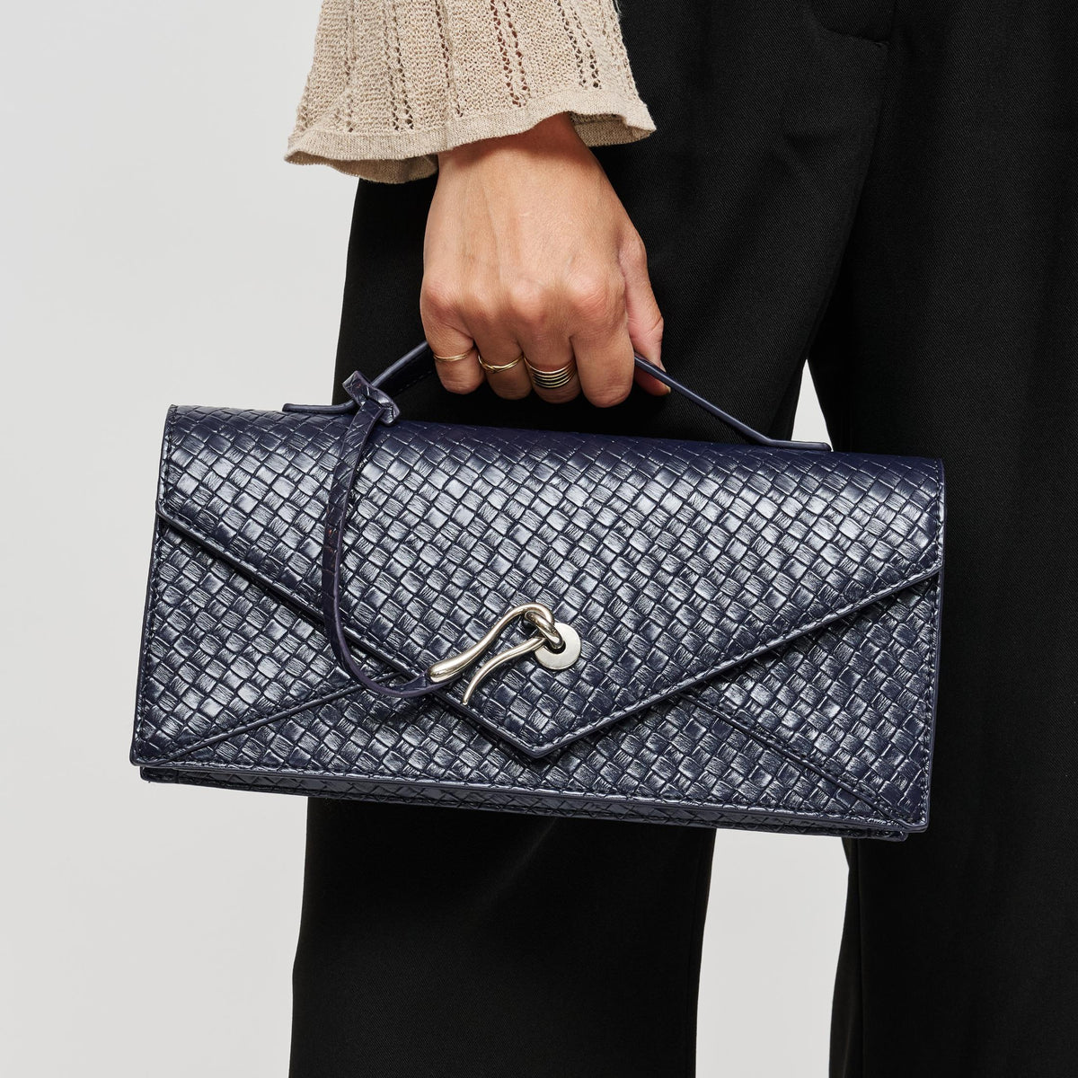 Woman wearing Navy Urban Expressions Khaleesi Clutch 840504211898 View 1 | Navy