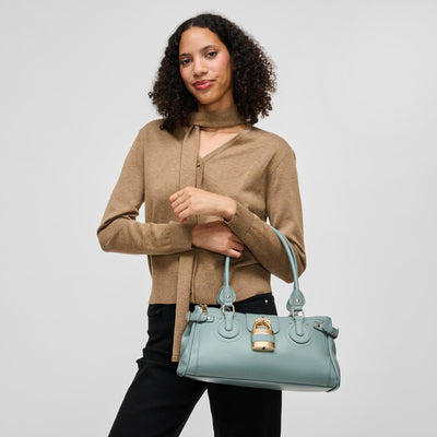 Woman wearing Dusty Blue Urban Expressions Moda Satchel 840504211676 View 1 | Dusty Blue