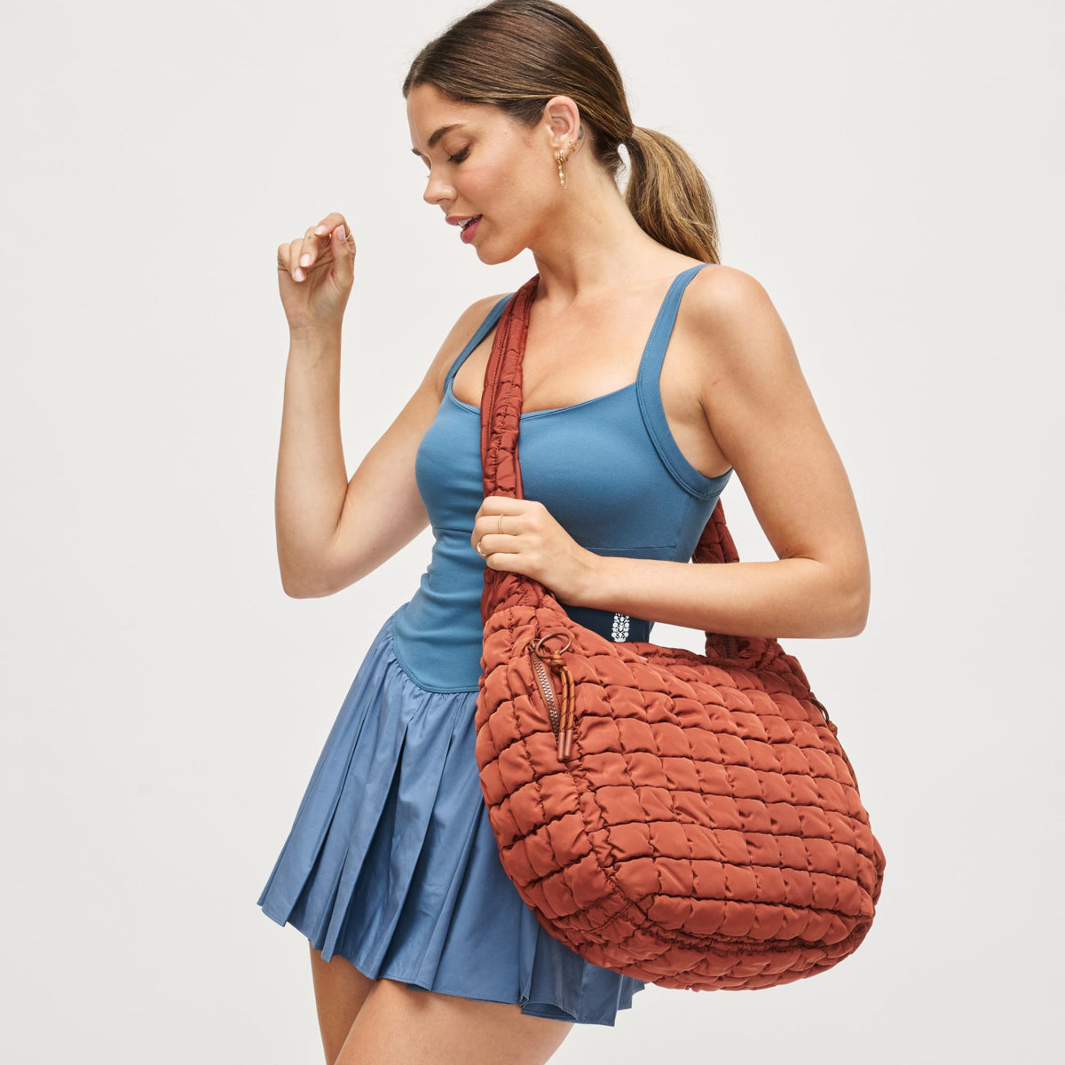 Woman wearing Rust Urban Expressions Tamsin - Quilted Puffer Hobo 840504200519 View 2 | Rust