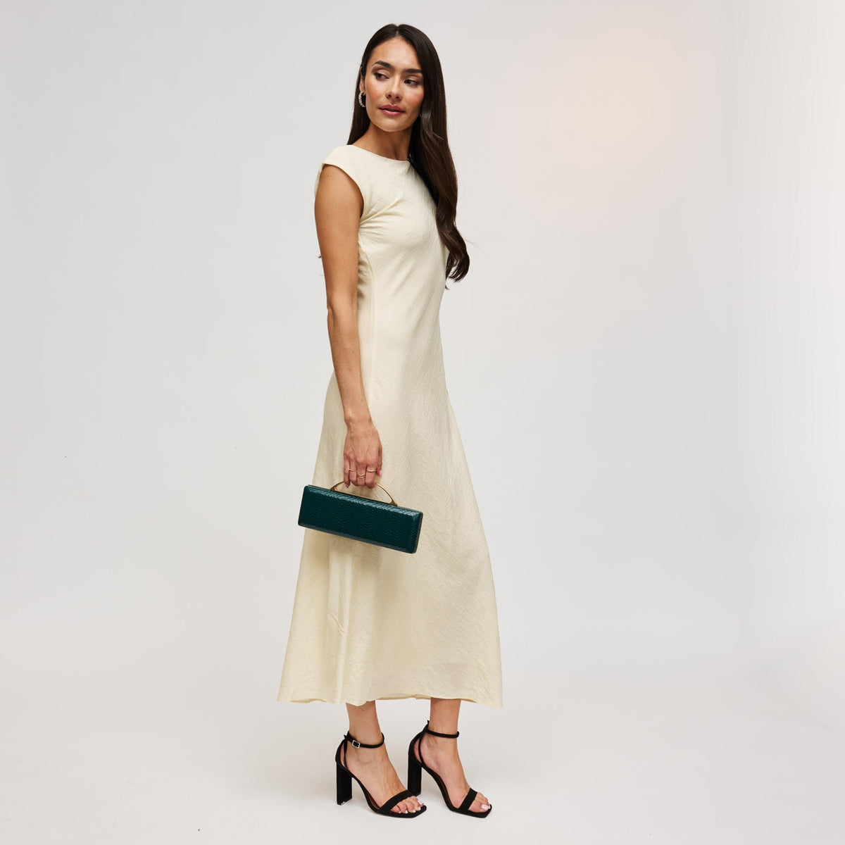 Woman wearing Emerald Urban Expressions Banks Clutch 840504212093 View 4 | Emerald