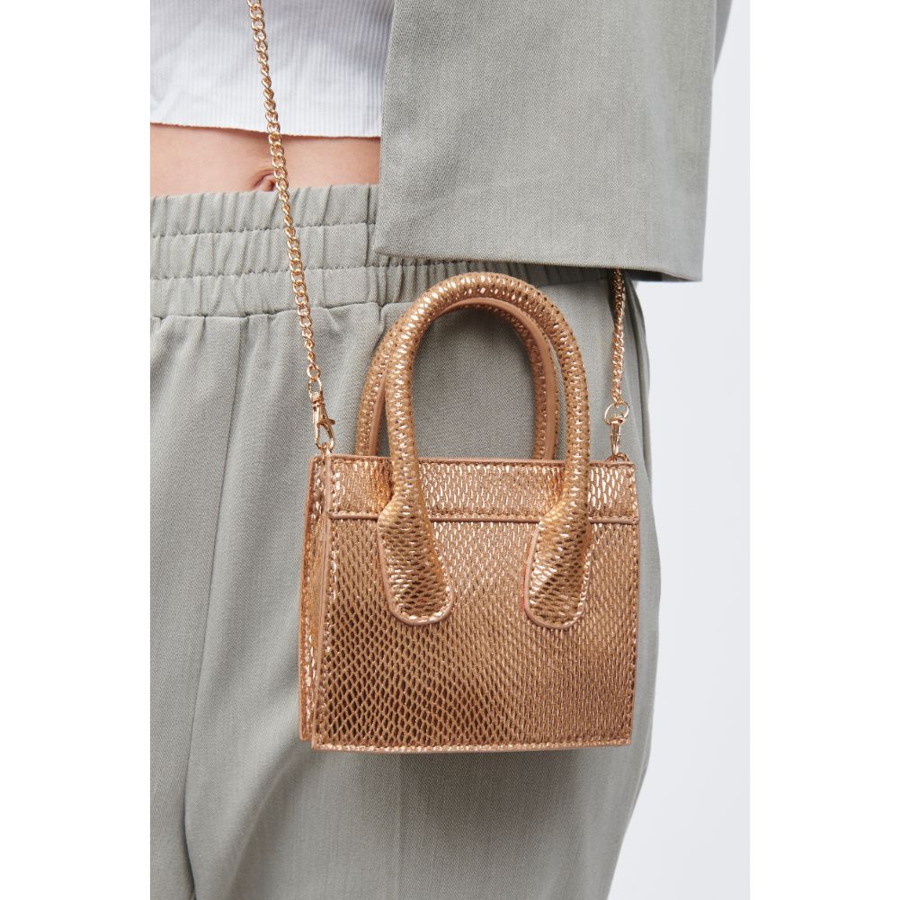 Woman wearing Rose Gold Urban Expressions Daria - Snake Crossbody 818209011181 View 1 | Rose Gold