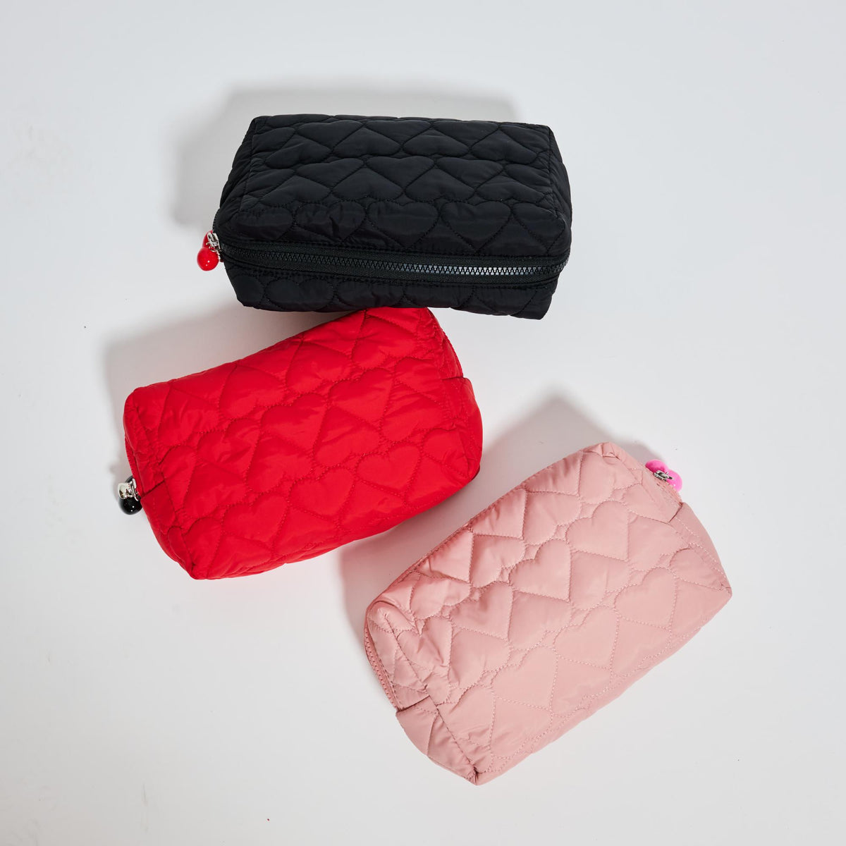 Woman wearing Red Urban Essentials Pull My Heart Cosmetic & Travel Organizer Pouch 840611196972 View 2 | Red