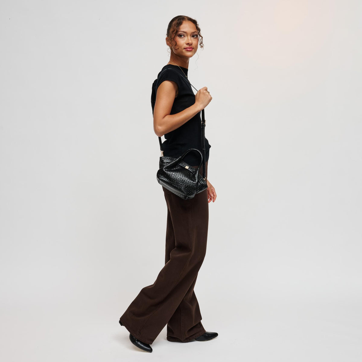 Woman wearing Black Urban Expressions Selena - Embossed Woven Crossbody 840504214080 View 4 | Black
