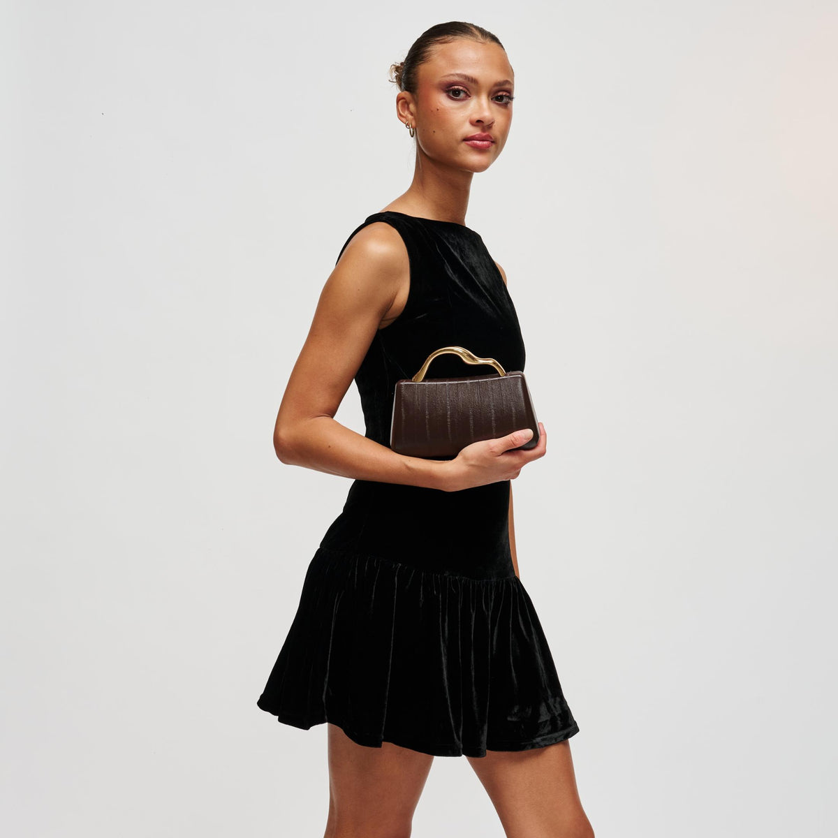 Woman wearing Espresso Urban Expressions Nichelle Clutch 840504212031 View 2 | Espresso