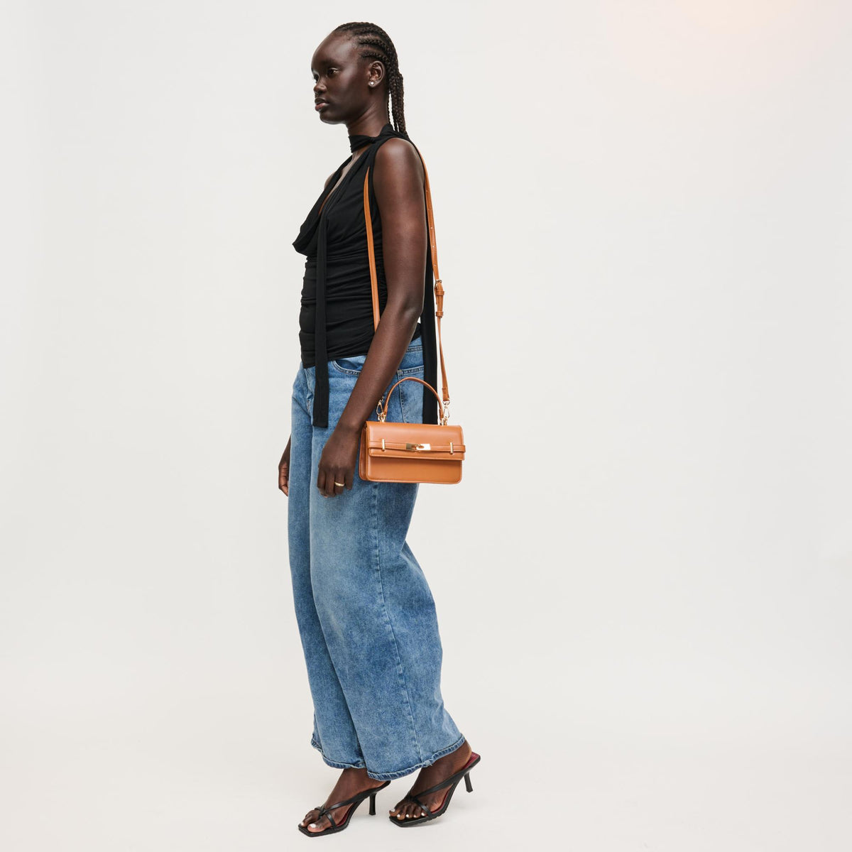 Woman wearing Cognac Urban Expressions Lily Crossbody 840504205811 View 2 | Cognac