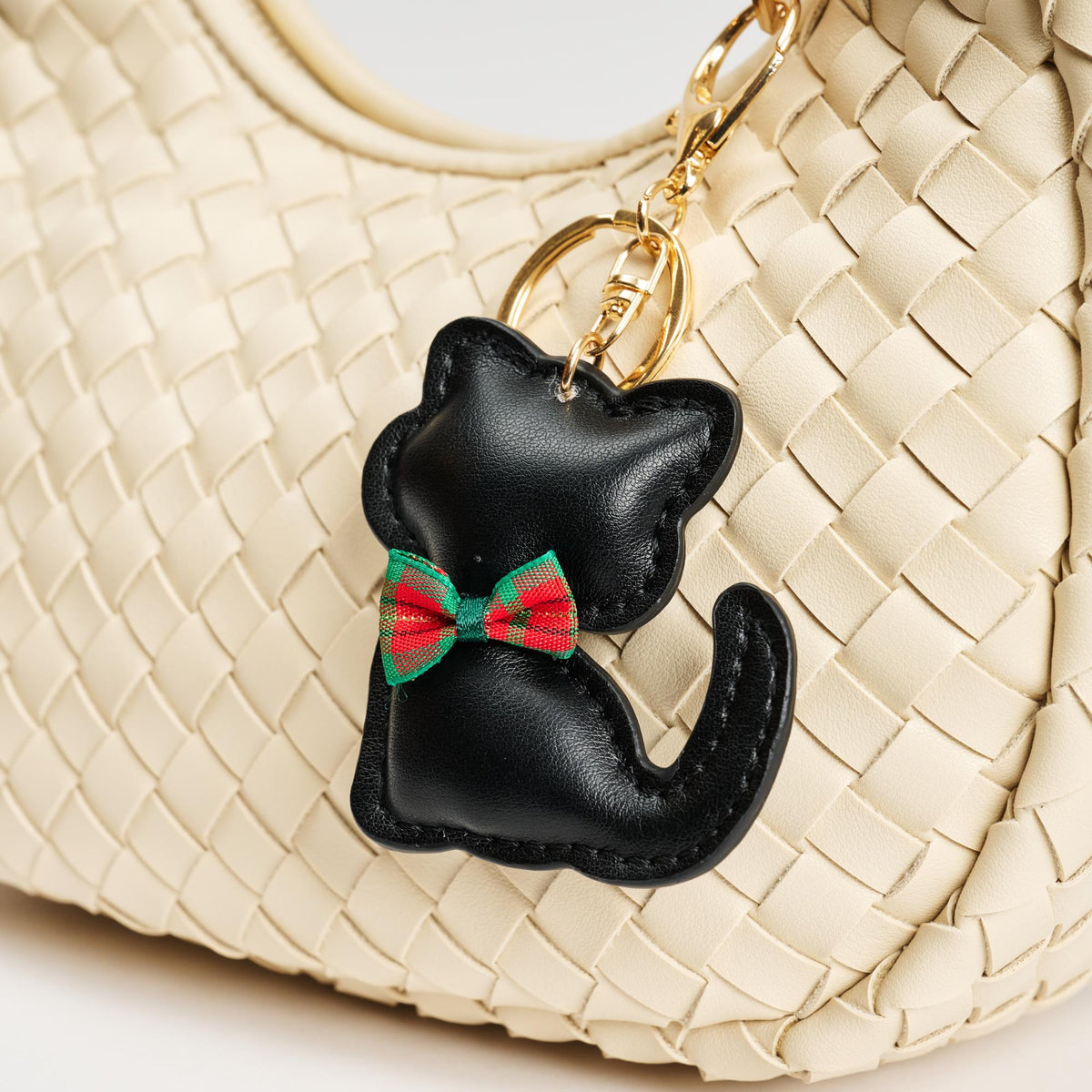 Woman wearing Black Urban Expressions Kat Keychain Charm 840611150721 View 1 | Black