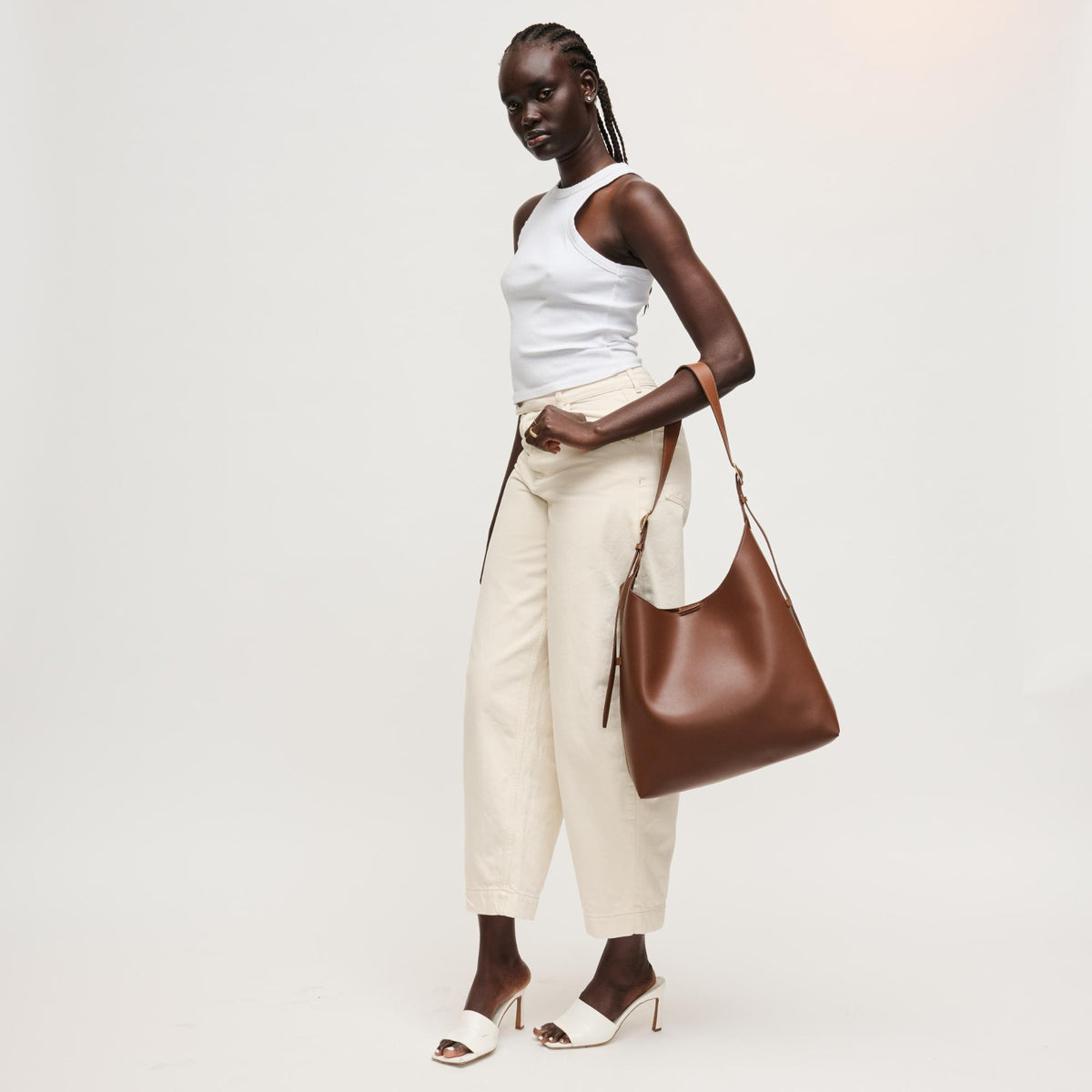 Woman wearing Chocolate Urban Expressions Maria Hobo 840504206269 View 2 | Chocolate
