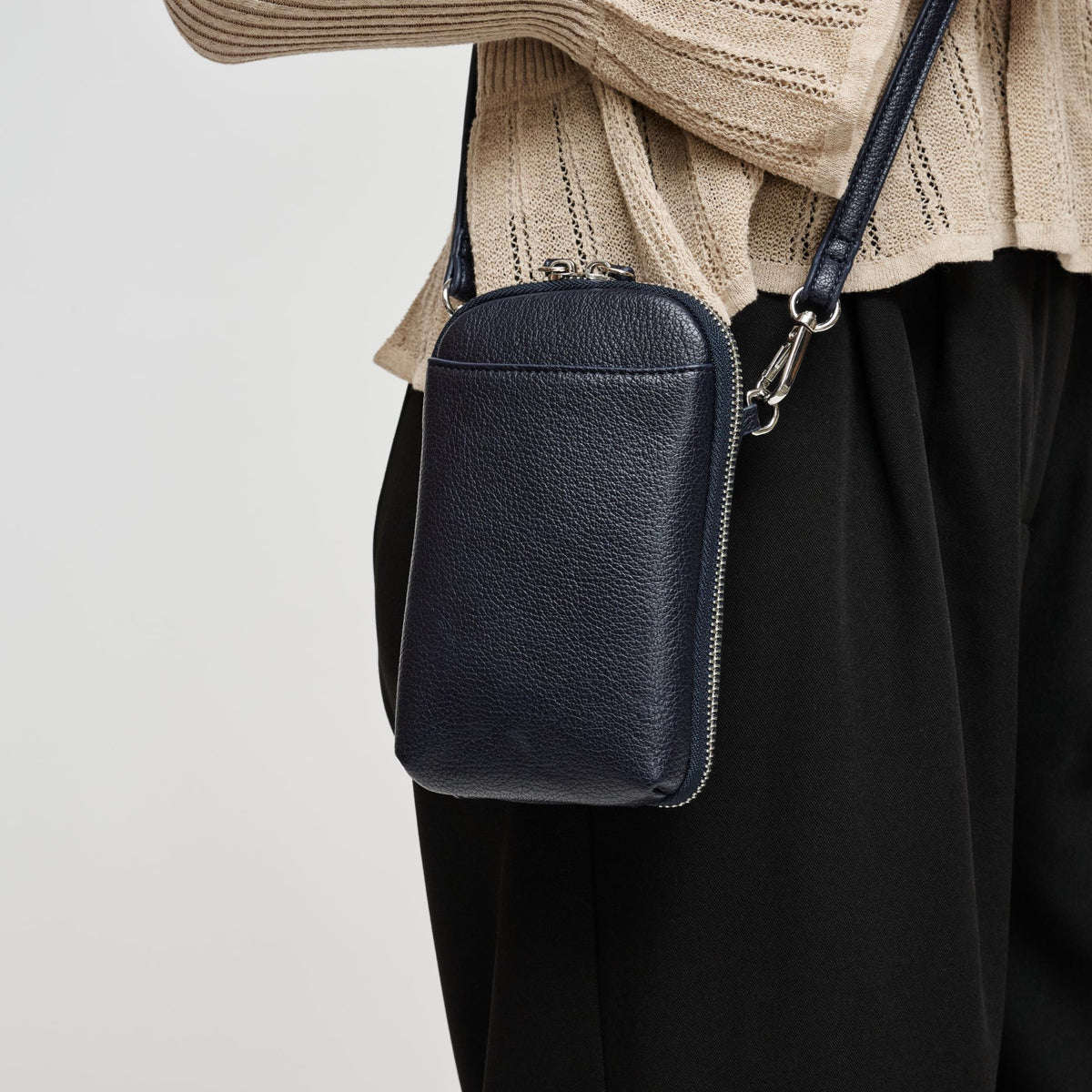 Woman wearing Midnight Urban Expressions Karen Cell Phone Crossbody 840504212772 View 1 | Midnight