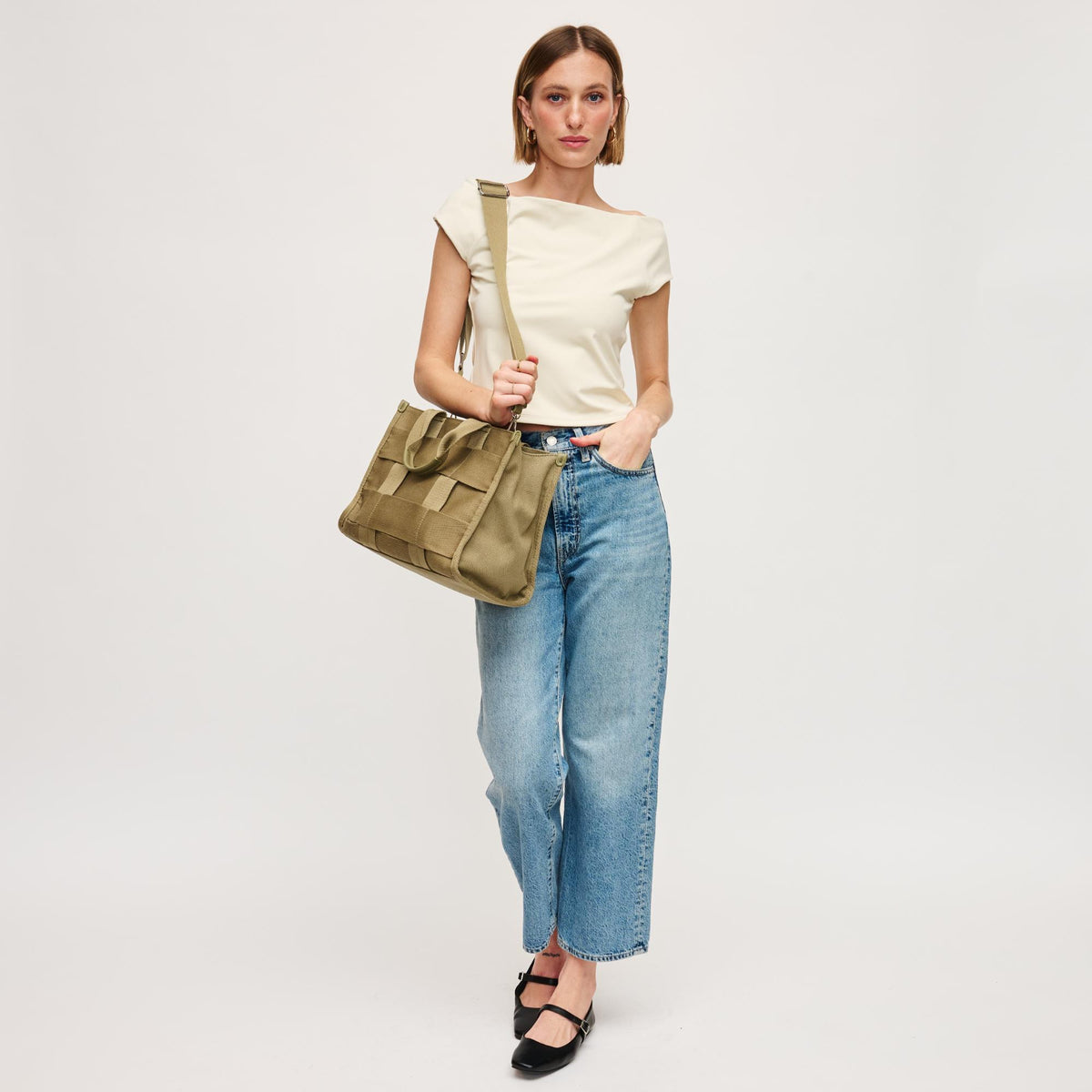 Woman wearing Sage Urban Expressions Cherie Satchel 840611157003 View 2 | Sage