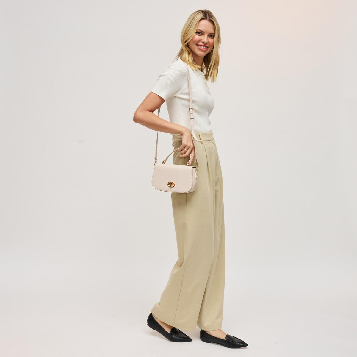 Woman wearing Oatmilk Urban Expressions Nadine Crossbody 840611198822 View 2 | Oatmilk