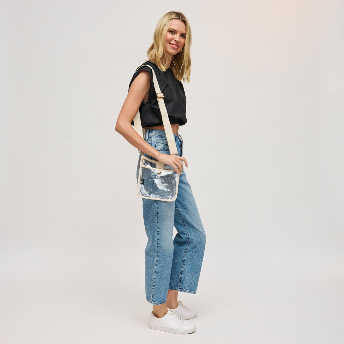 Woman wearing Oatmilk Urban Expressions Beckham - Clear Crossbody 840504201417 View 3 | Oatmilk