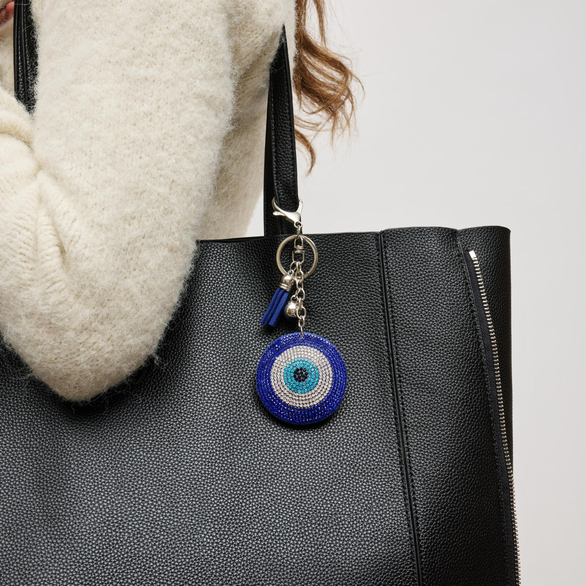 Woman wearing Blue Urban Expressions Elysian Eye Hanging Charm 840611196262 View 2 | Blue