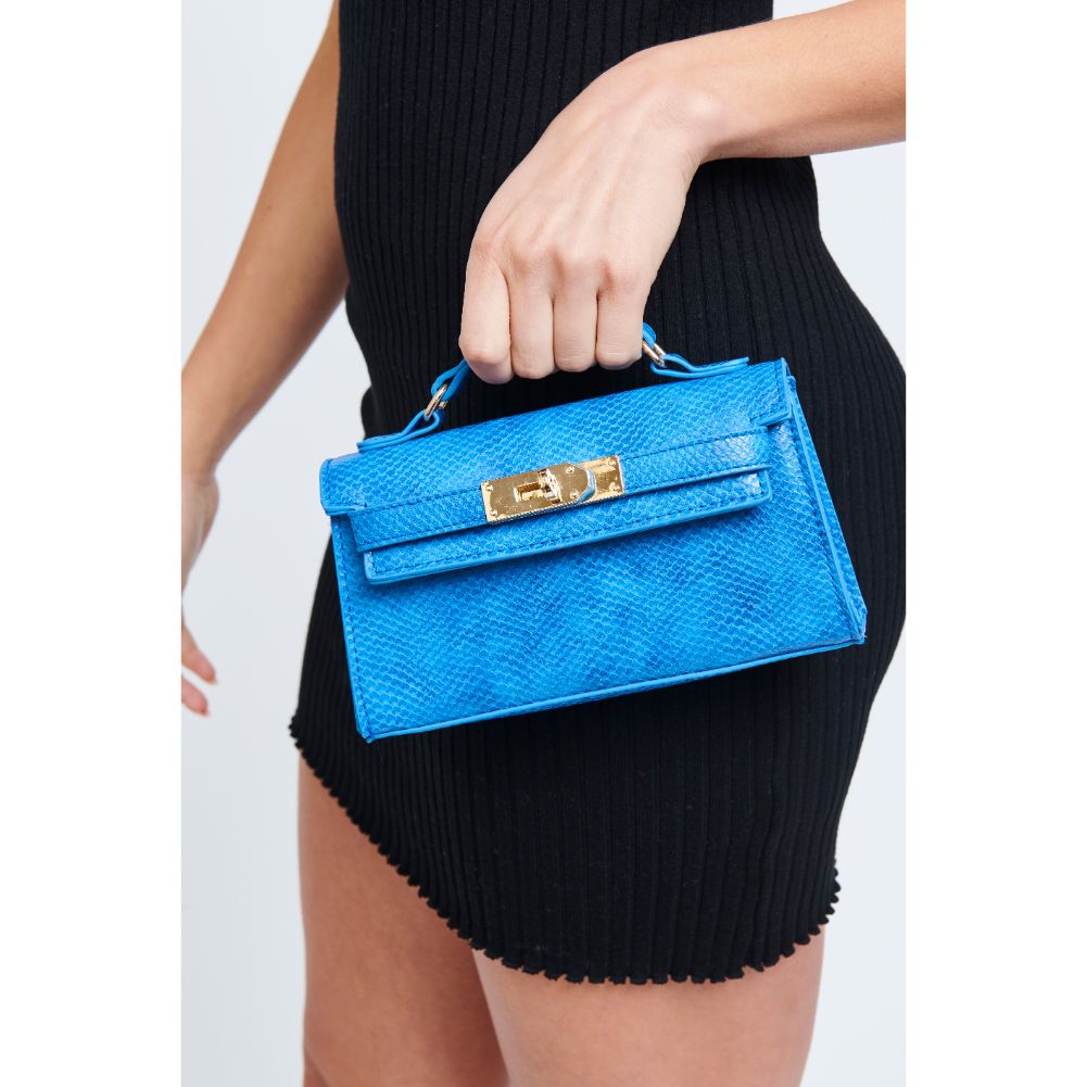Woman wearing Blue Urban Expressions Georgina Snake Crossbody 840611181275 View 3 | Blue